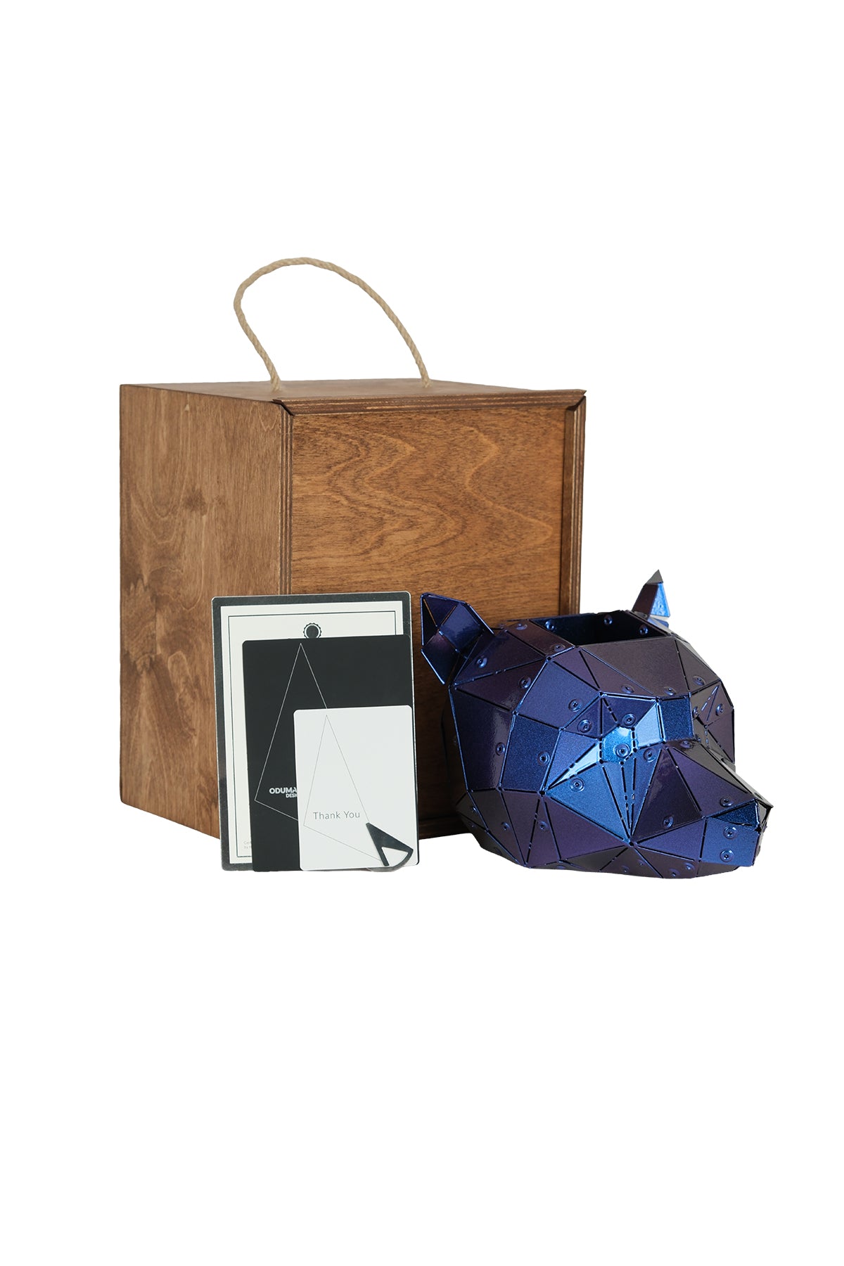 Iridescent purple Bear Head sculpture in its custom wooden presentation box